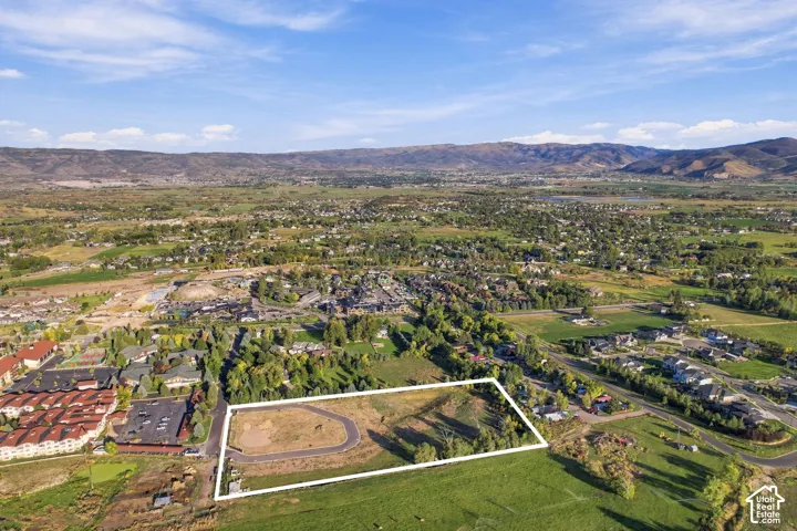Expansive undeveloped parcel with established perimeter
