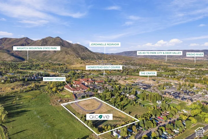 Aerial perspective showcasing surrounding terrain, Zermatt Resort, and Homestead Golf Course