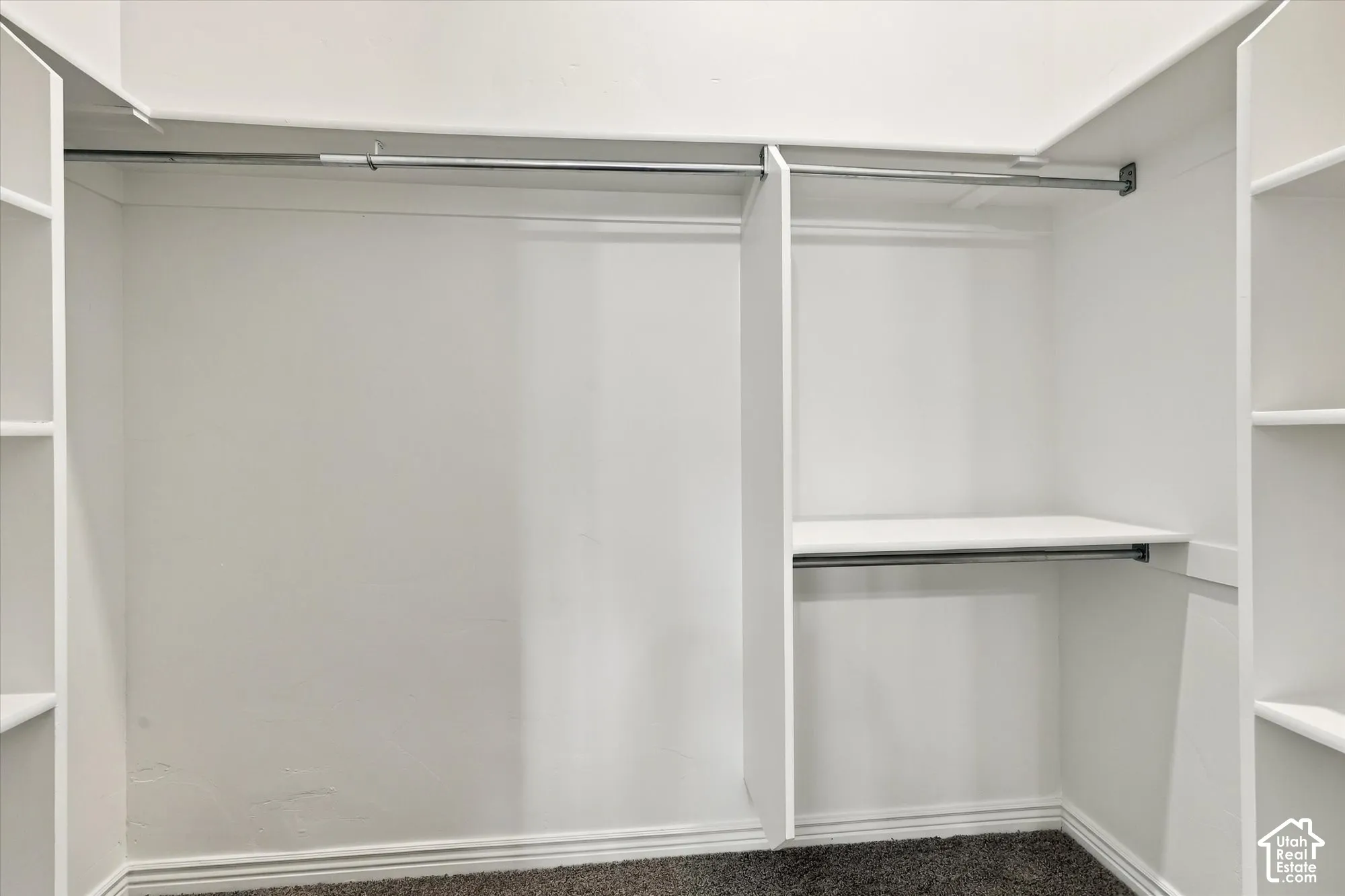 Integrated shelving units, multiple clothing rods, and wall-to-wall carpeting