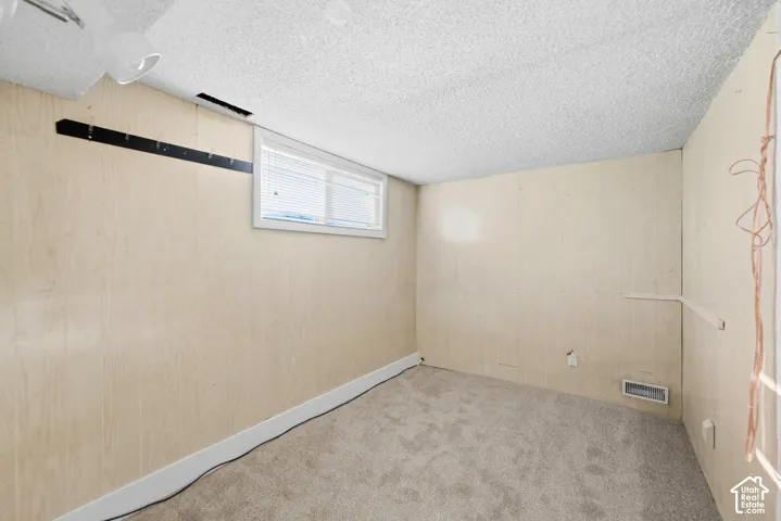 New carpeting and wood-panel walls
