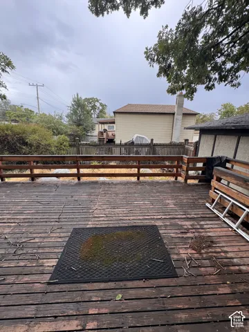 Expansive wood deck with a perimeter railing