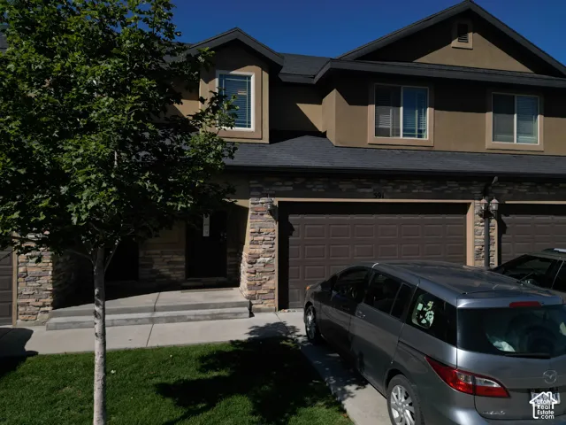 Stucco exterior with stone accents