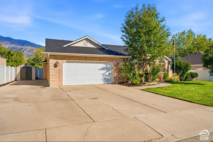 Brick exterior with a two-car garage