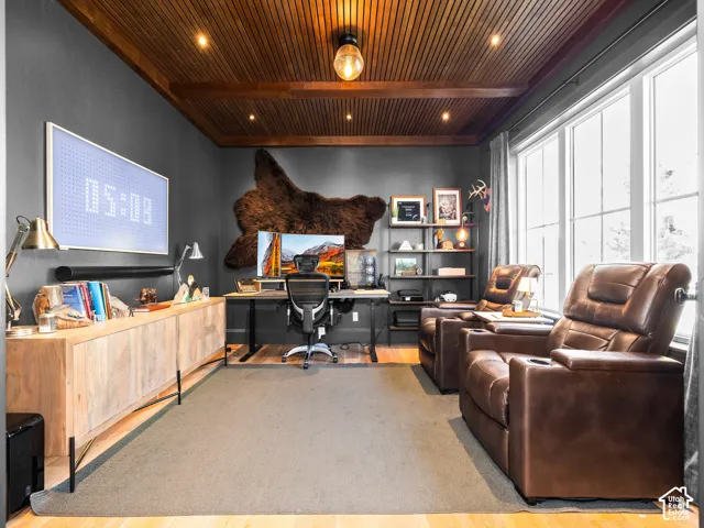 Wood-paneled ceiling with recessed lighting