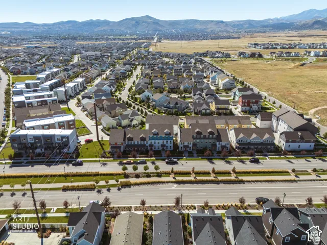 Expansive residential area featuring a variety of architectural styles, including multi-story townhomes and single-family residences