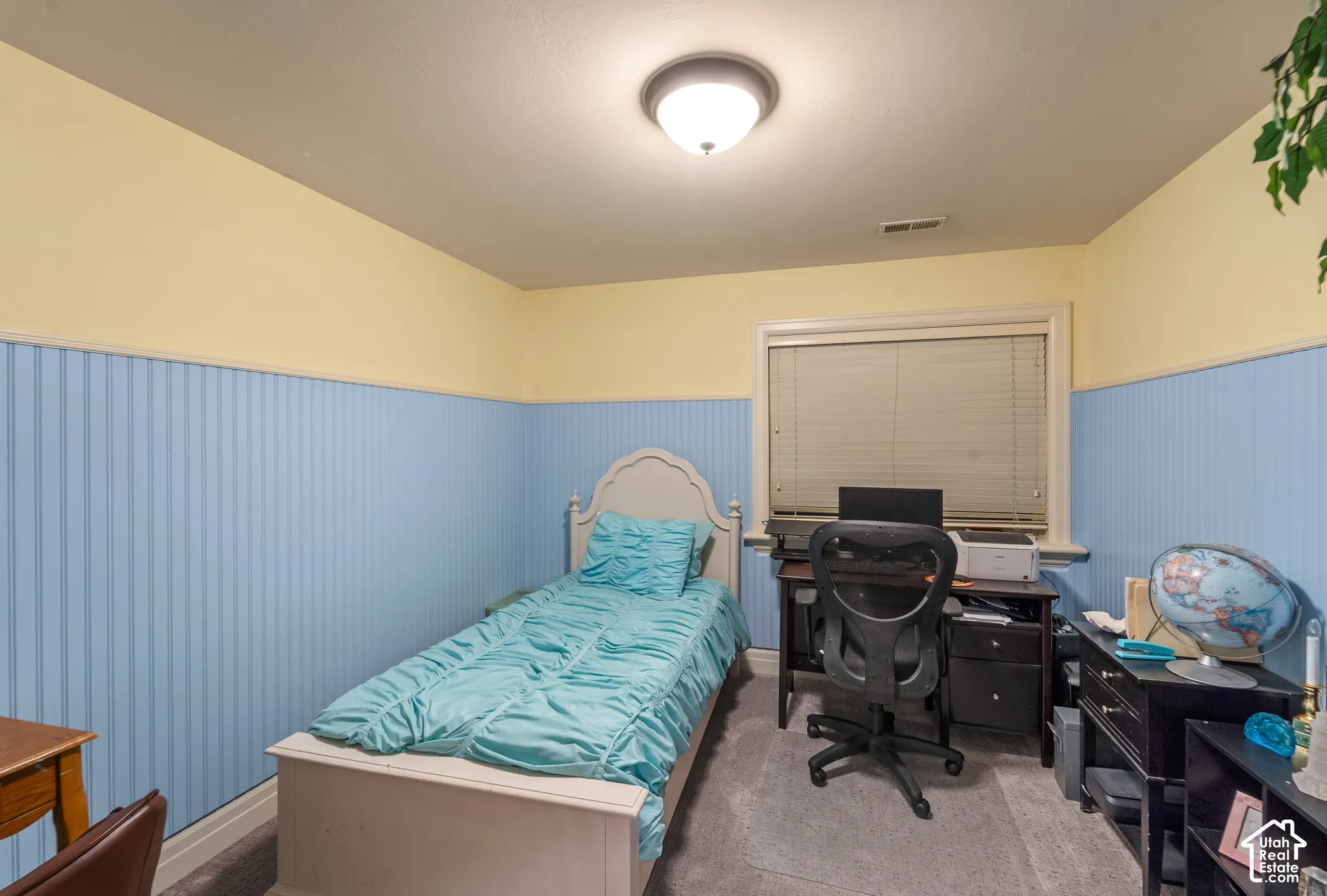 This is the fourth bedroom on the second floor. There is a large window for plenty of natural light and a large walk-in-closet.