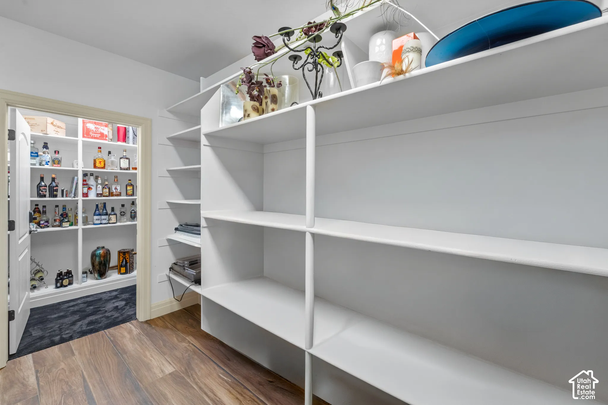 This house has SO MUCH storage!! Most of the storage has extensive built-in shelving. You can walk through this room to the lockable storage room beyond.