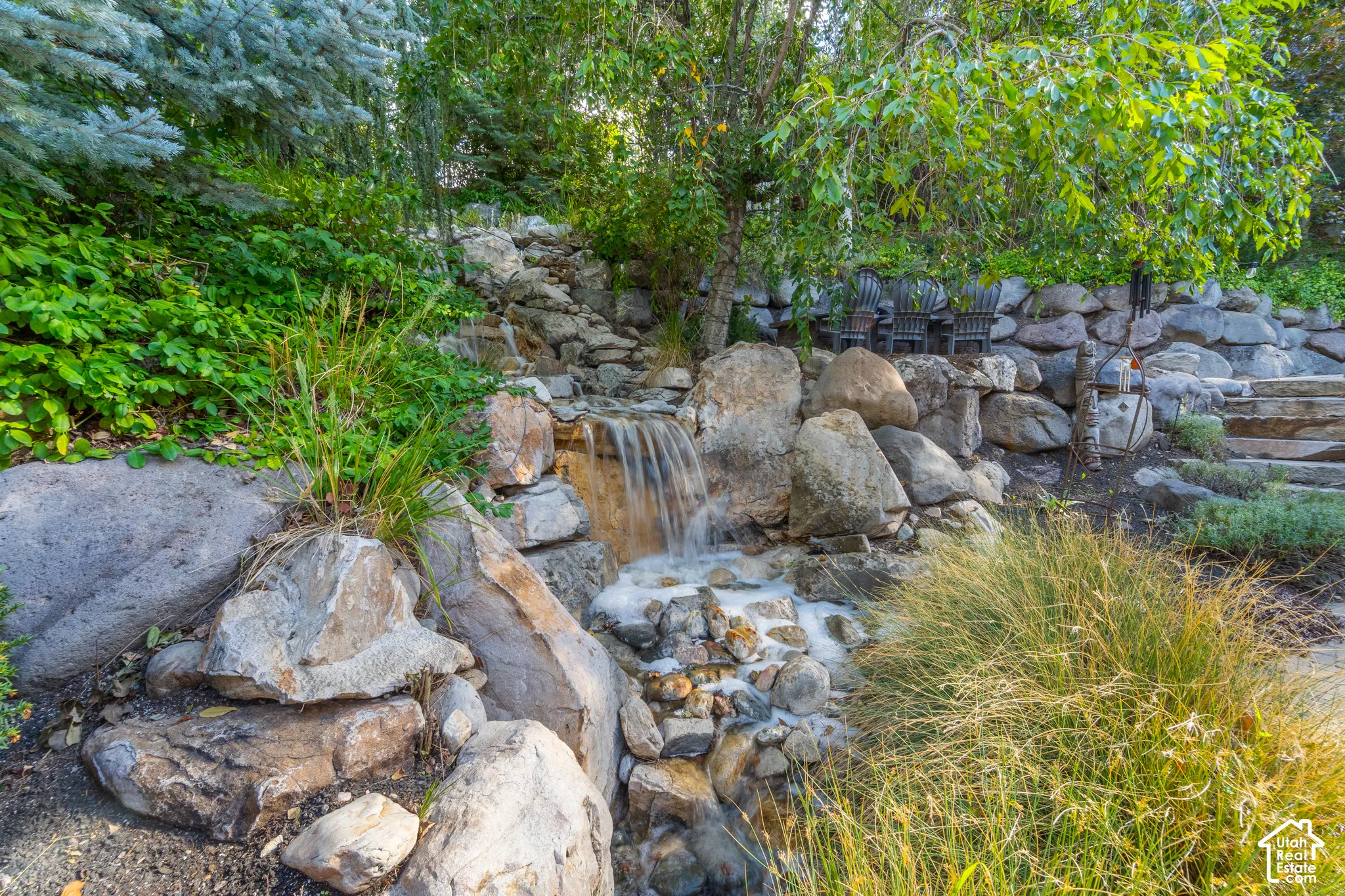 The waterfall is right out the back door and creates a peaceful ambiance both inside and out.