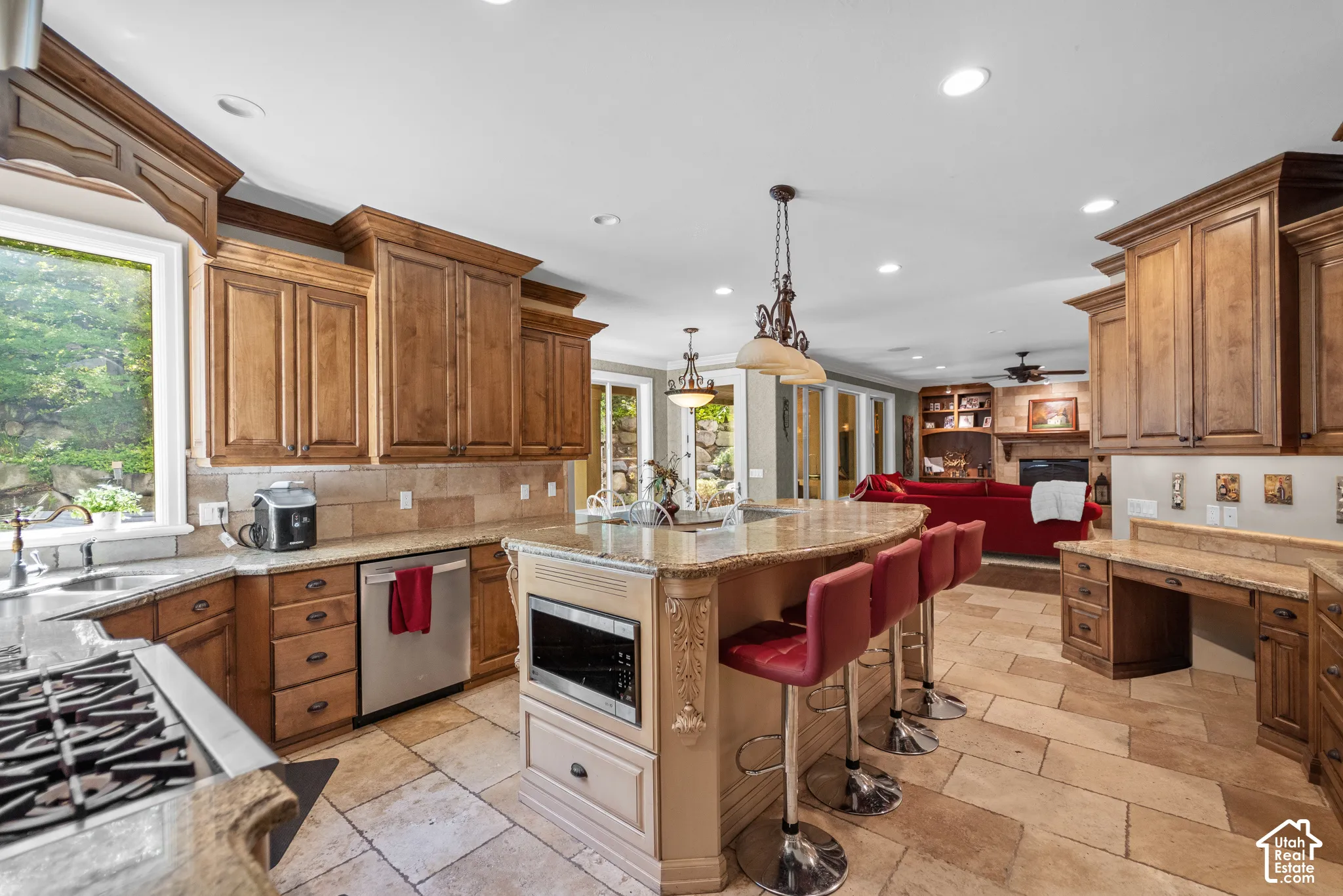 Thoughtful finishes like a built in microwave, huge pantry and plenty of cabinetry keep the countertops clutter free.