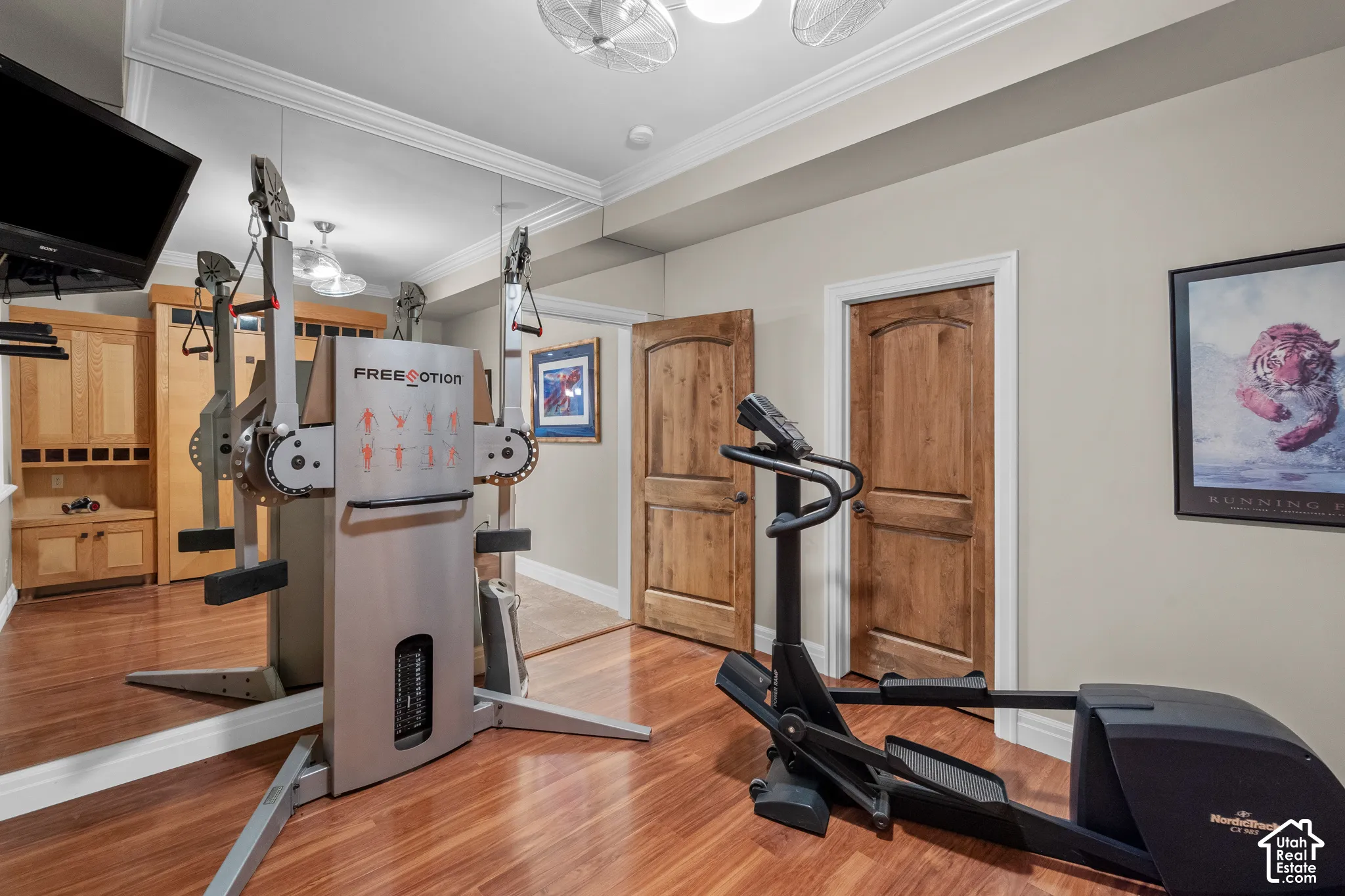 This bedroom (#6) is currently being used as an exercise room. With it's full-wall mirror, and wall mounted T.V. You can get in a good workout, take a steam shower and then watch a movie!!