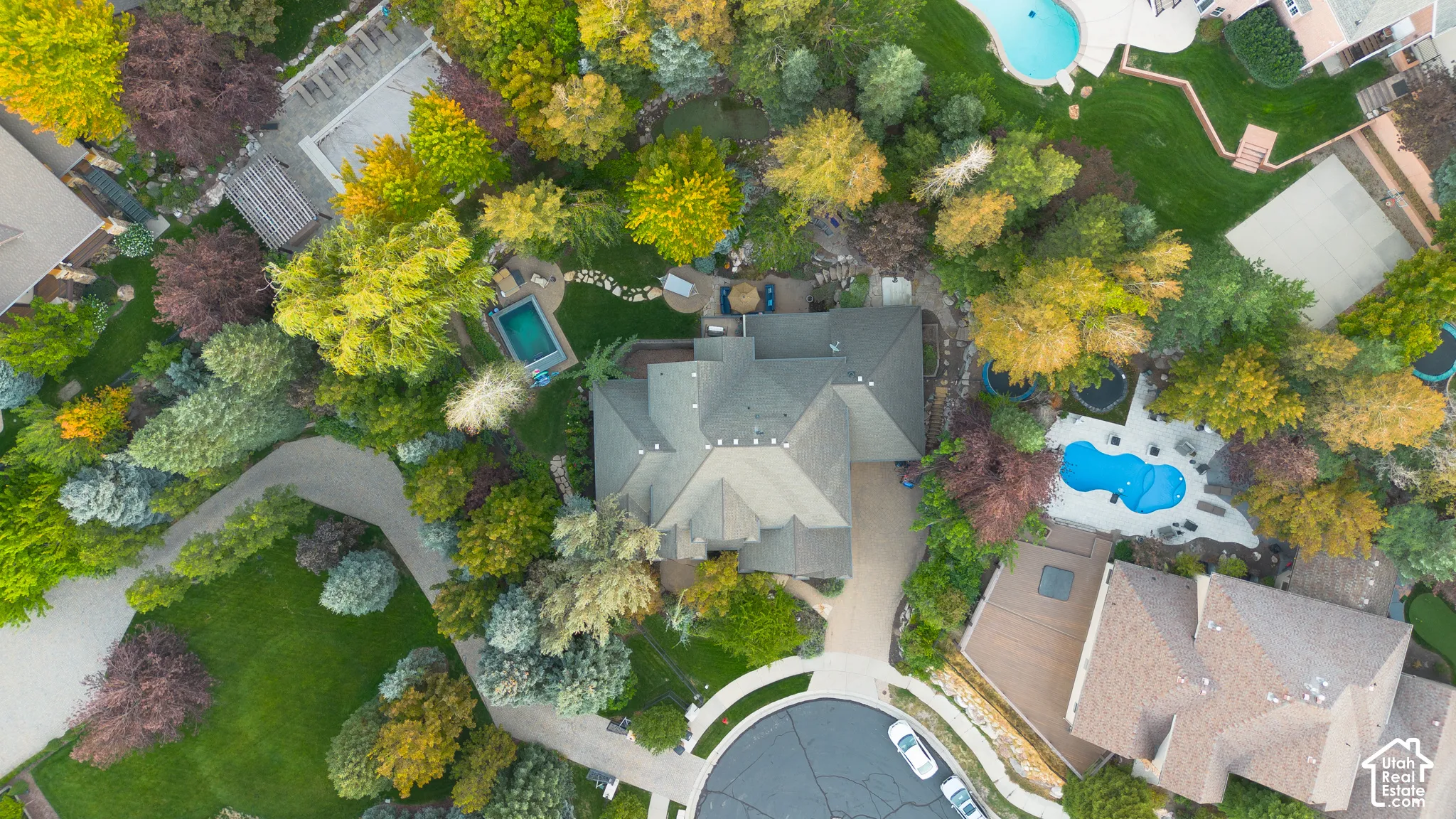 Heavily planted with mature trees, and located on a quiet cul-de-sac, in a private gated community you will love this heaven on earth.
