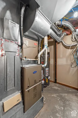 This Carrier furnace system is one of two in the home, with different zones to keep each are warm or cool as needed.