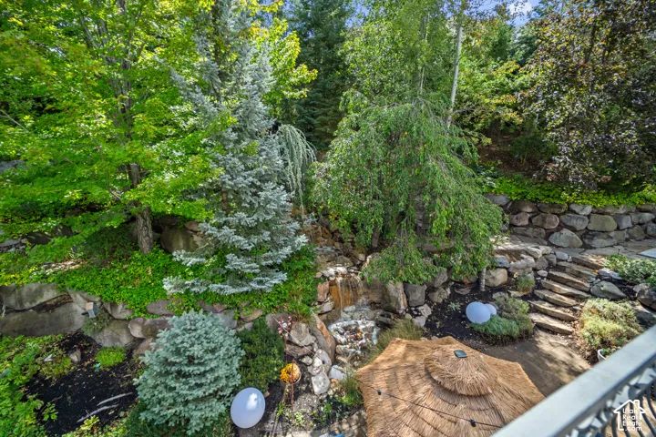 Wake up to this view every morning from the Primary bedroom deck. Have a morning drink and watch the sun rise slowly over your wooded back yard. Or watch the evening set in while you put up your feet and read a good book.