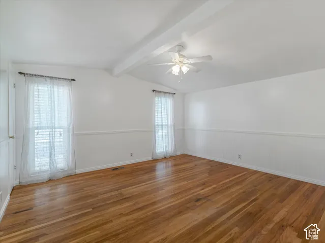 Primary Bedroom with vaulted ceilings