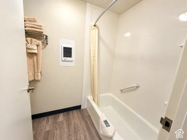 Wood-finish flooring with a contrasting dark trim