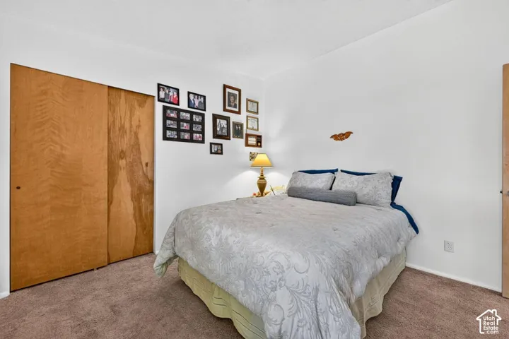 Recessed closet with wood-finish bi-fold doors