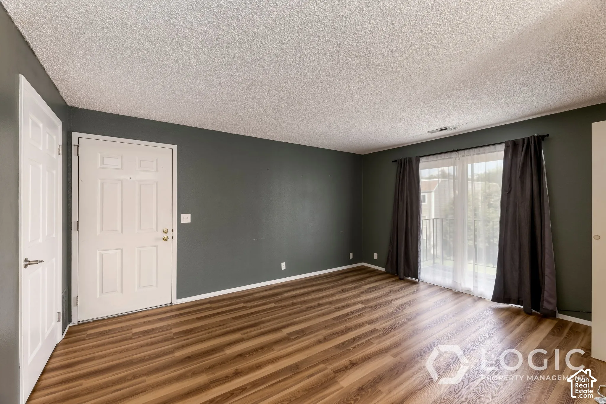 Wood-finish flooring throughout