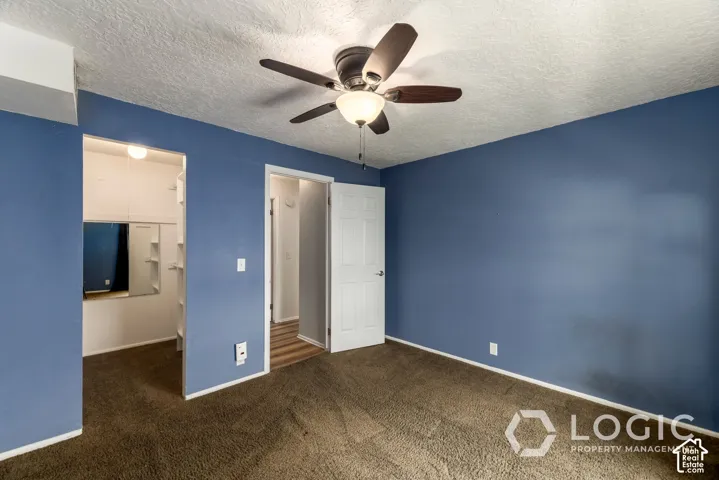 Recessed closet with integrated shelving and a built-in mirror