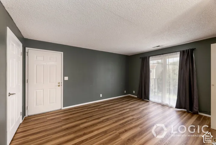 Wood-finish flooring throughout