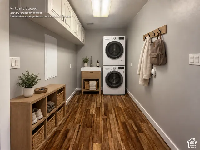 Wood-finish flooring with light gray walls, white baseboards, and overhead lighting