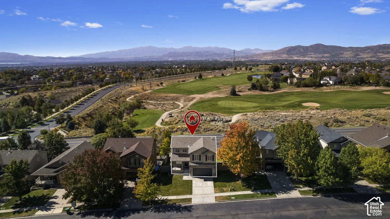 Property featuring a multi-level exterior, concrete driveway, and mature landscaping