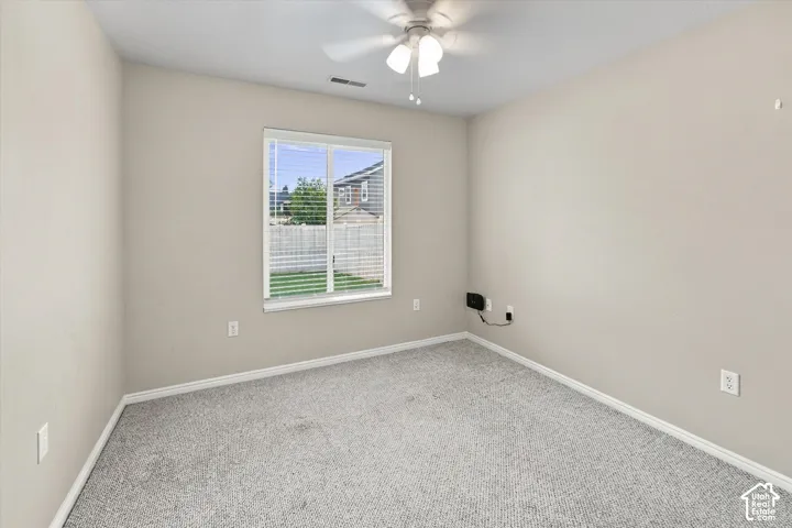 Neutral tone walls with carpeting