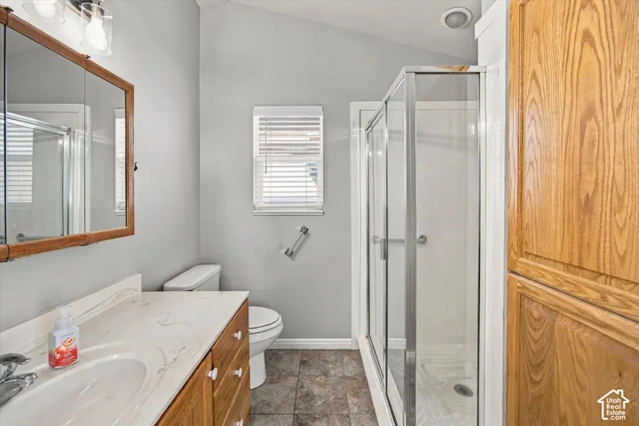 Vanity with integrated sink and stone-finish countertop