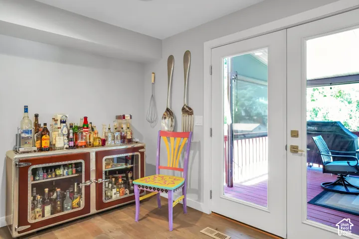 Wood-finish flooring with a light gray wall color