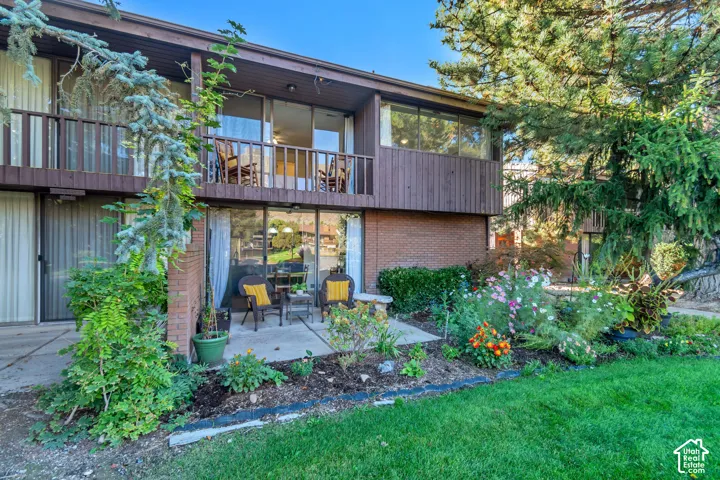 Ground-level patio with sliding glass door access