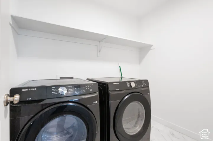 White wall shelving, white walls, and light-colored flooring