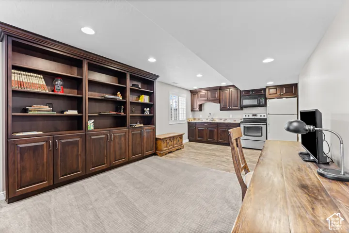 Integrated kitchenette with stainless steel appliances