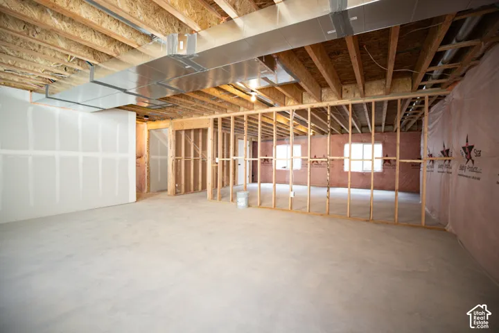 Unfinished basement with potential for large family/game room, three bedrooms and unfinished basement.