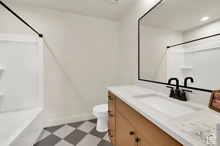 White solid surface countertop with integrated rectangular sink and matte black faucet