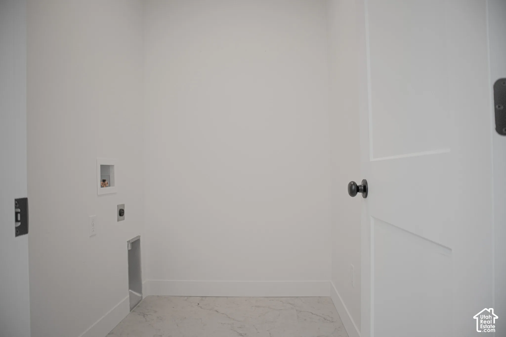 Full-size, dedicated laundry room.