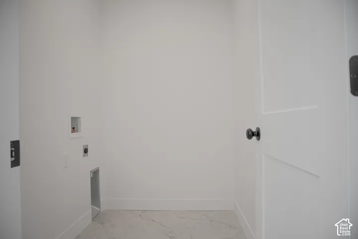 Full-size, dedicated laundry room.