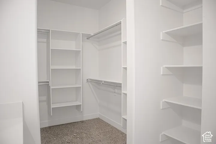 Spacious walk-in closet as part of primary suite.