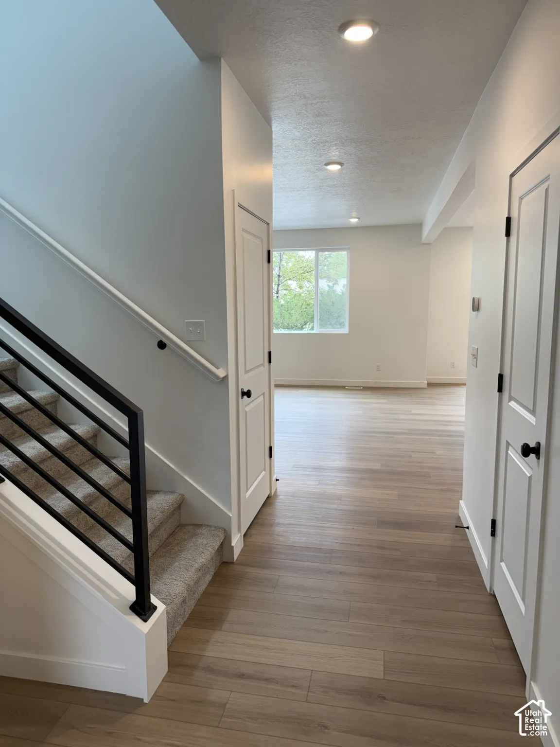 Wood-finish flooring throughout the main level