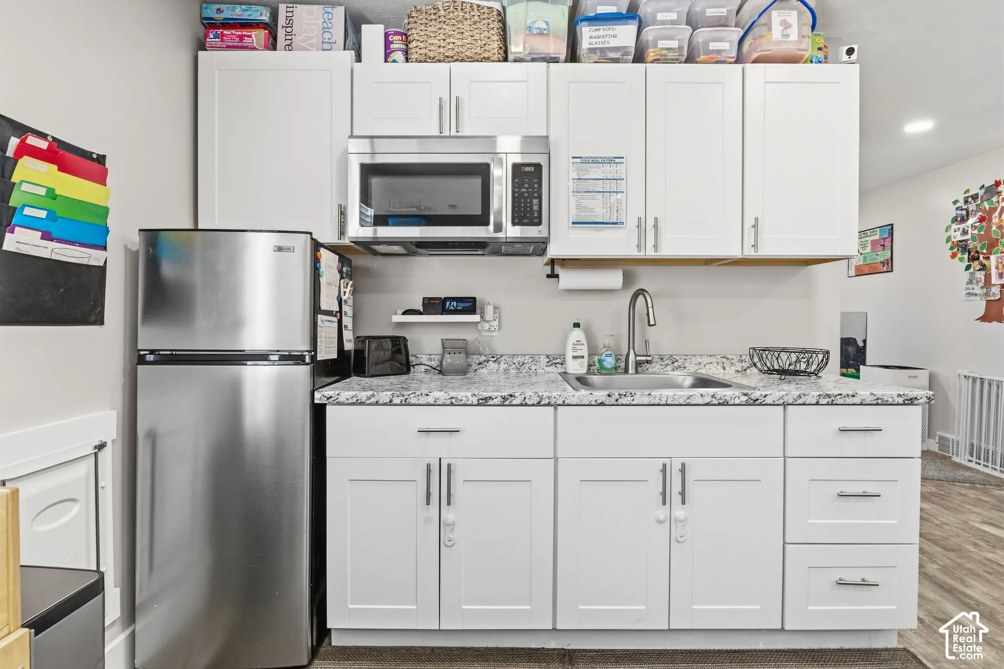 White cabinetry with brushed nickel hardware