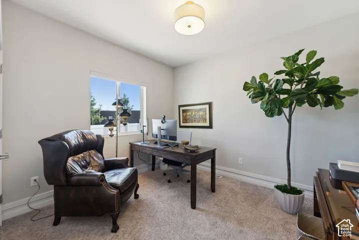 Recessed lighting with a semi-flush mount fixture, carpeted flooring, and white trim