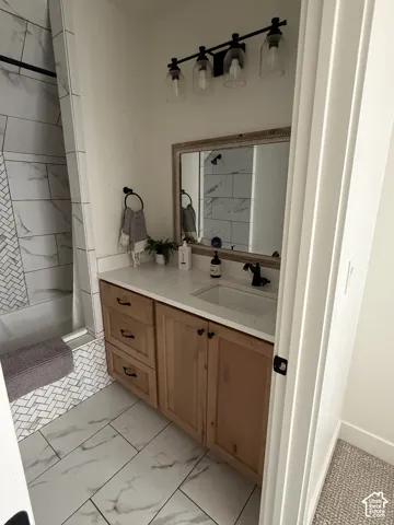Light wood-finish vanity with ample storage