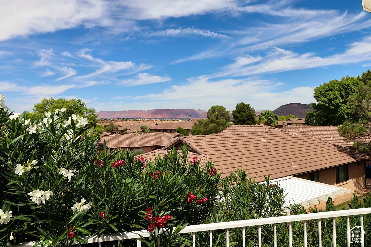 Expansive outdoor scenery featuring distant mountains and a clear sky