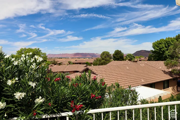 Expansive outdoor scenery featuring distant mountains and a clear sky