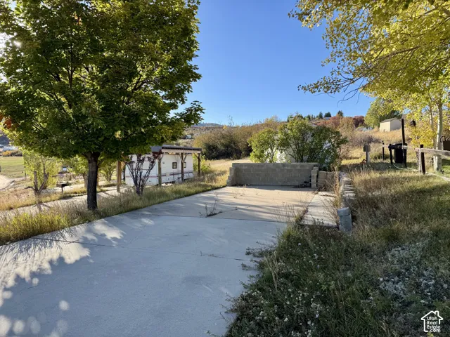 Concrete pad with a partial block wall on lot 162