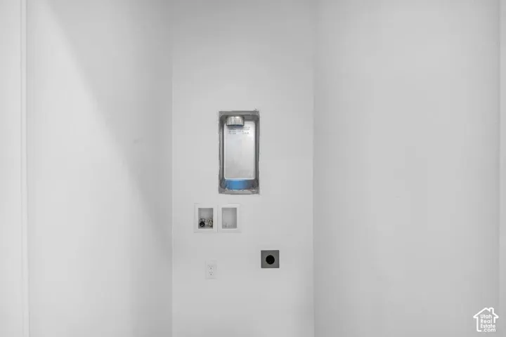 Utility space with washer and dryer hookups