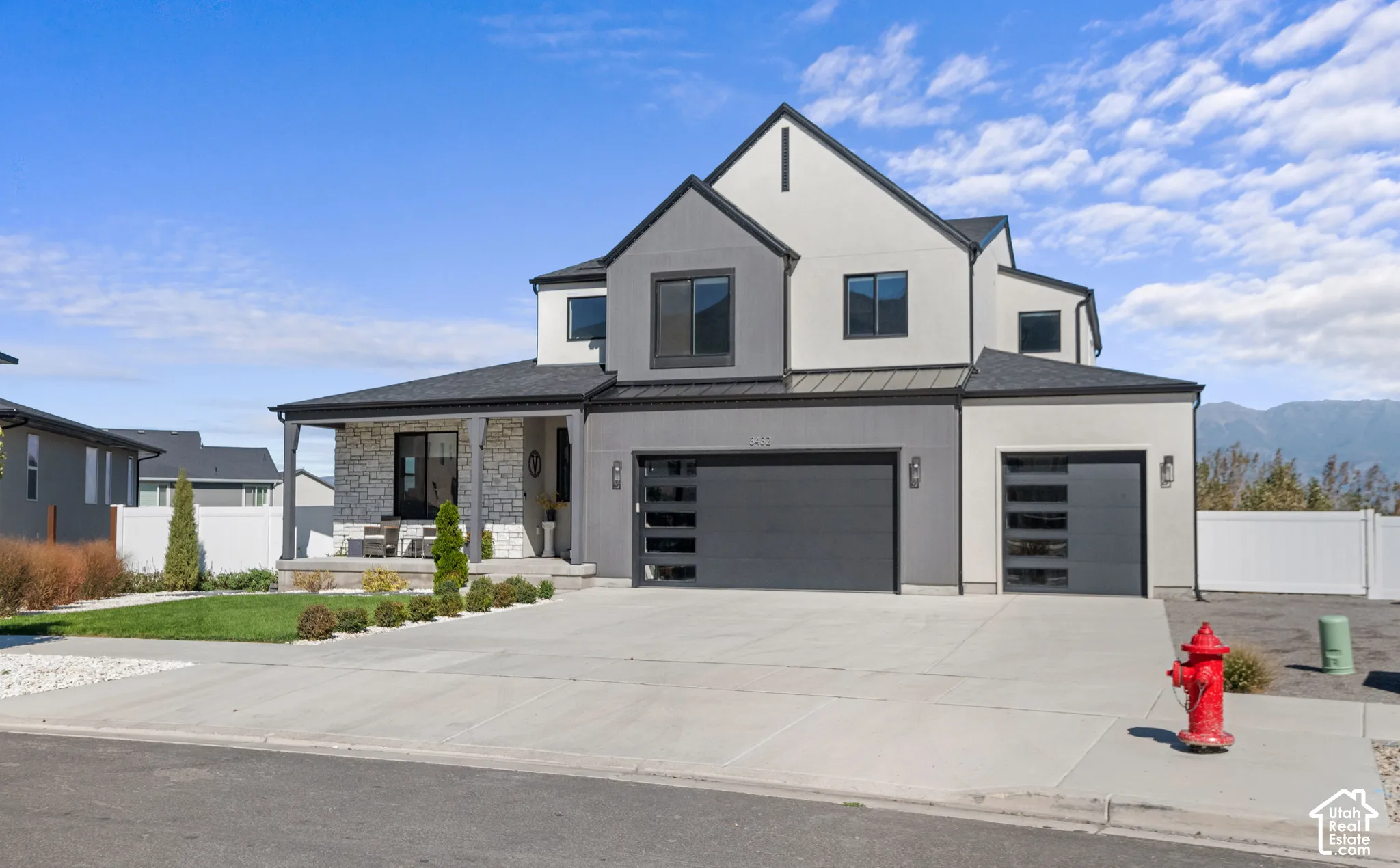 Contemporary stucco and stone exterior