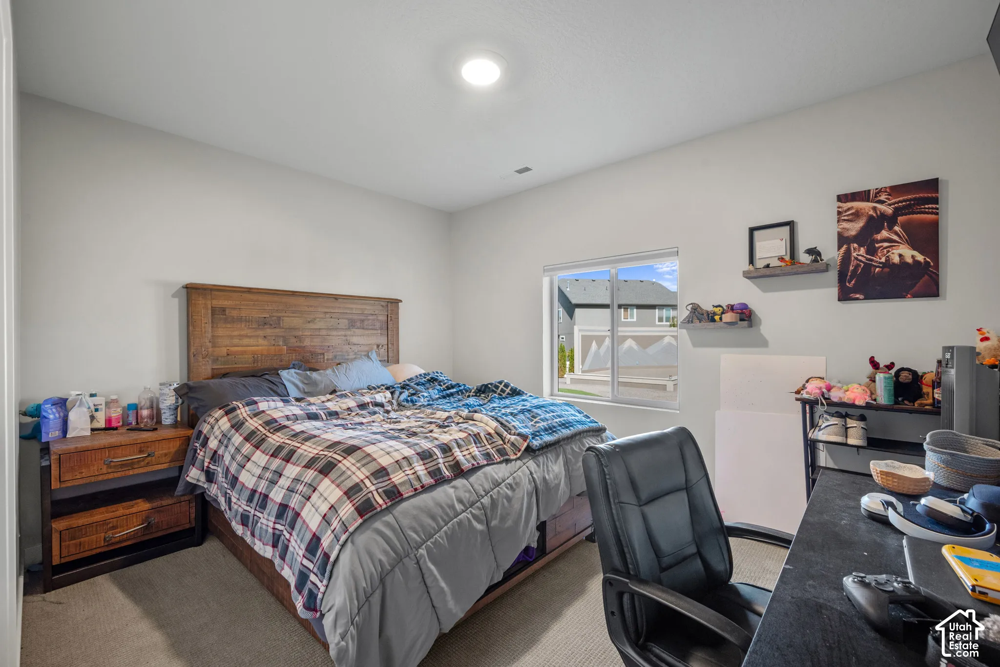 Carpeted flooring, recessed lighting, double-pane window, and light gray wall paint