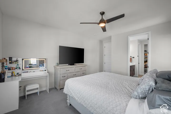 Recessed lighting, wood-finish flooring, and a contemporary ceiling fan