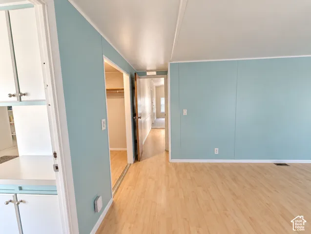 Light wood-finish flooring, walk-in closet.