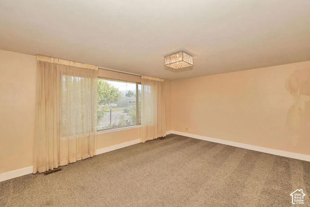 Recessed window with full-height drapes