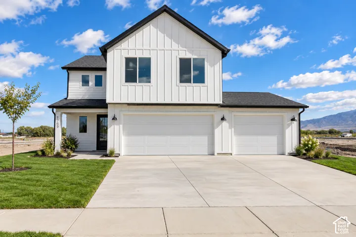 This is a digital mock up of how the home will look with a third car garage